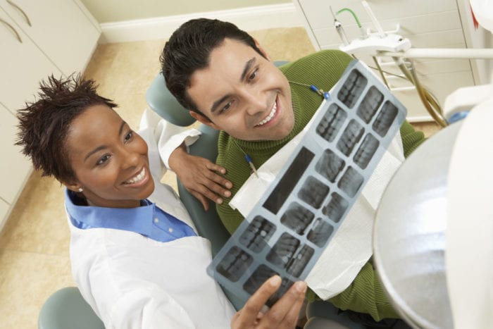 Dentist and Patient Examining X-ray periodontal surgery knoxville tn