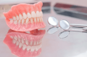 close-up image of dentures sitting on table restorative dentistry dentist in Knoxville Tennessee